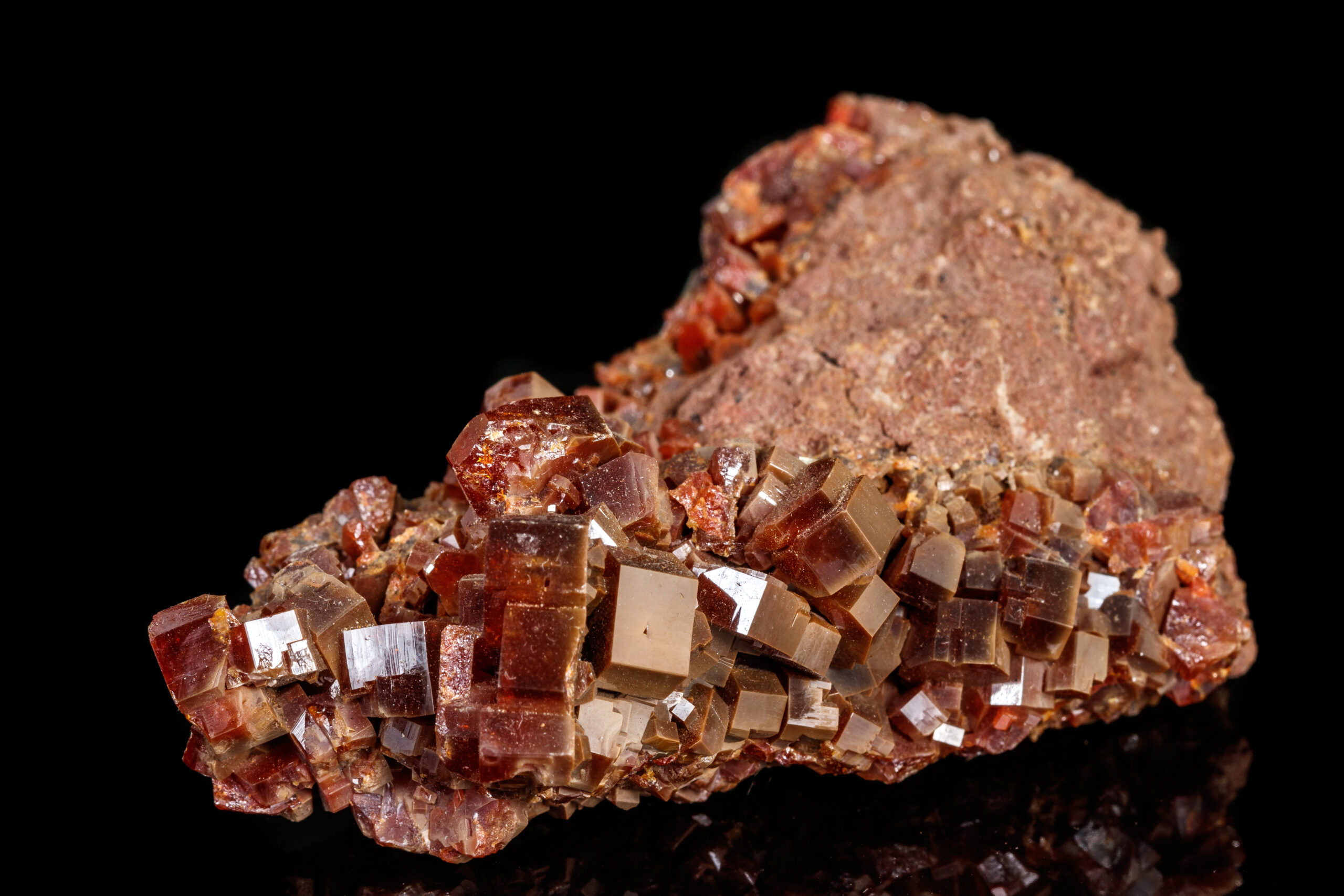 Macro mineral stone Vanadinite on a black background close up